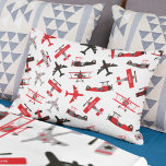 Retro Red and Black WWII Military Airplane Pattern Accent Pillow<br><div class="desc">Give your little airman his very own retro plane accent throw pillow. Pillow features red and black vintage airplanes in a pattern. Personalize the pillow with your young boy's first name, which fits on several of the aircraft wings. This pillow is perfect for anyone who loves flying, airplanes, history, and...</div>