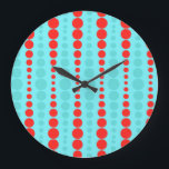 Retro Red and Turquoise Dots Round Wall Clock<br><div class="desc">Whoever said, “Dot, dot not a lot, ” never saw this Retro Red and Turquoise Dots Round Wall Clock. It features an aqua background with rows of vibrant red and turquoise circles in graduated sizes. This vintage inspired pattern is like the Russian nesting dolls of the polka dot world! It’s...</div>
