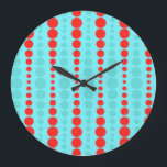 Retro Red and Turquoise Dots Round Wall Clock<br><div class="desc">Whoever said, “Dot, dot not a lot, ” never saw this Retro Red and Turquoise Dots Round Wall Clock. It features an aqua background with rows of vibrant red and turquoise circles in graduated sizes. This vintage inspired pattern is like the Russian nesting dolls of the polka dot world! It’s...</div>
