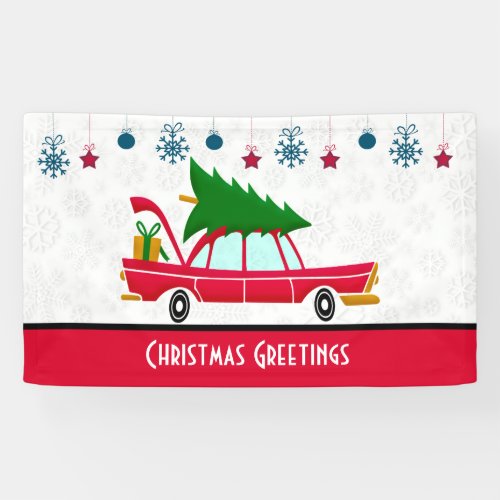 Retro Red Car Carrying a Christmas Tree Banner