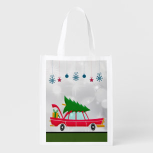 Retro Red Car Carrying a Christmas Tree Grocery Bag