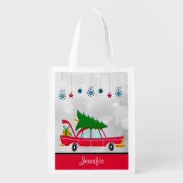 Retro Red Car Carrying a Christmas Tree Grocery Bag