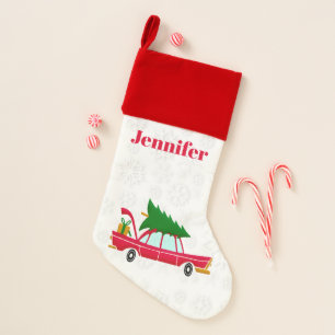 Retro Red Car Carrying a Christmas Tree Stocking