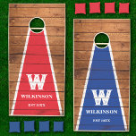 Retro Rustic Wood Red and Blue Family Monogram Cornhole Set<br><div class="desc">Create your own personalized cornhole game with our easy to use distressed rustic wood effect template. Add a custom family name,  monogram and an optional date. A wholesome classic,  this design is ideal for weddings,  family reunions,  birthday parties and so much more.</div>