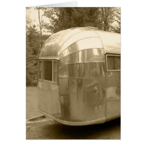 Retro shiny aluminum trailer take time to reflect