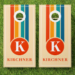 Retro Stripes Orange Monogram Family Name Cornhole Set<br><div class="desc">Retro Stripes Orange Monogram Family Name Cornhole Set. Personalize this custom design with your own family name and monogram initial. The perfect summer lawn party game for your family lakehouse,  cottage,  or beach house.</div>