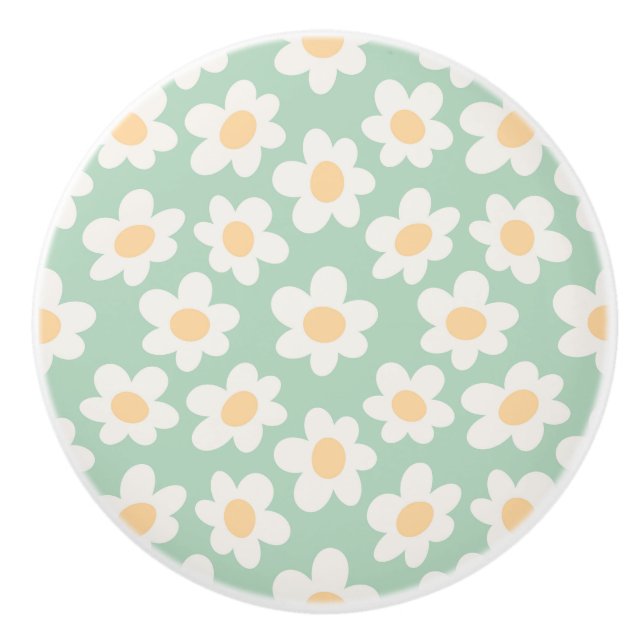 Retro style daisies in bloom on green background ceramic knob (Front)