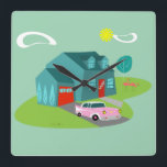 Retro Suburban House Acrylic Wall Clock<br><div class="desc">This Retro Suburban House Acrylic Wall Clock pattern features a typical American home in a typical American neighborhood, circa 1950. A teal home with a peacock blue roof, and turquoise windows are perfectly offset by a vibrant red front door and garage door. A classic pink, 1950’s finned convertible car is...</div>