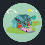 Retro Suburban House Acrylic Wall Clock<br><div class="desc">This Retro Suburban House Acrylic Wall Clock pattern features a typical American home in a typical American neighborhood, circa 1950. A teal home with a peacock blue roof, and turquoise windows are perfectly offset by a vibrant red front door and garage door. A classic pink, 1950’s finned convertible car is...</div>