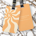 Retro sun rays monogram initial groovy luggage tag<br><div class="desc">Luggage tag featuring a retro,  pale orange sun with radiating rays and your monogram initial.</div>