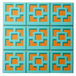 Retro Turquoise and Orange Trellis Ceramic Tile<br><div class="desc">Add a splash of mid-century modern Palm Springs everywhere you go with this retro turquoise and orange trellis pattern ceramic tile. It was inspired by vintage concrete breeze blocks. The deconstructed take on 1950s architecture will give an instant designer feel to everyday life.</div>