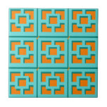 Retro Turquoise and Orange Trellis Ceramic Tile<br><div class="desc">Add a splash of mid-century modern Palm Springs everywhere you go with this Retro Turquoise and Orange Trellis pattern ceramic tile. It was inspired by vintage concrete breeze blocks. The deconstructed take on 1950s architecture will give an instant designer feel to everyday life.</div>