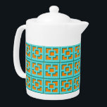 Retro Turquoise and Orange Trellis Teapot<br><div class="desc">Add a splash of mid-century modern Palm Springs everywhere you go with this Retro Turquoise and Orange Trellis pattern teapot. It was inspired by vintage concrete breeze blocks. The deconstructed take on 1950s architecture will give an instant designer feel to everyday life.</div>