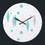 Retro Turquoise Diamond & Starburst Wall Clock<br><div class="desc">This Retro Turquoise Diamonds and Starbursts Wall Clock (large print) pattern is a new take on a vintage style. It features kitschy, grey starbursts on turquoise polka dots, surrounding geometric, turquoise and grey diamond shapes. Customize the background color on this mid century modern product if you're feeling daring, or leave...</div>
