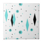 Retro Turquoise Diamonds & Starbursts Ceramic Tile<br><div class="desc">This Retro Turquoise Diamonds and Starbursts Ceramic Tile is a new take on a vintage style. It features kitschy, black starbursts on turquoise polka dots, surrounding geometric, turquoise and black diamond shapes. Customize the background color on this mid century modern product if you're feeling daring, or leave it white if...</div>