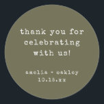 Retro Typewriter Olive Custom Wedding Thank You Classic Round Sticker<br><div class="desc">This wedding thank you sticker features an earthy olive green background with typewriter-style typography for a clean, modern look. The round format is ideal for sealing envelopes, favor bags, boxes, or wrapping paper. Names and date can be personalized to match your wedding details. A simple, timeless finishing touch for modern...</div>