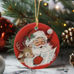 Retro Vintage Santa With Baby Rudolf Christmas Ceramic Ornament<br><div class="desc">This mid-century vintage Christmas ornament features a jolly Santa Claus looking over his list as a baby Rudolf looks on.</div>
