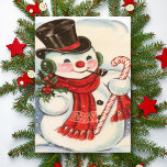 Retro Vintage Snowman in Top Hat Custom Christmas Holiday Card<br><div class="desc">Customize this cute vintage Christmas card that features a snowman wearing a red scarf and black top hat while holding a sprig of mistletoe in one hand a candy cane in the other. Personalize the text by adding your name or use the design editing tool to change the font style...</div>