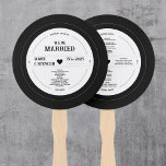Retro Vinyl Record Wedding Program Hand Fan<br><div class="desc">Keep your guests cool and stylish with our personalized vinyl record hand fans. The unique design of these fans is shaped like a vinyl record and features your wedding program printed on the back. The fans are a functional and decorative addition to your wedding, and can be easily customized to...</div>