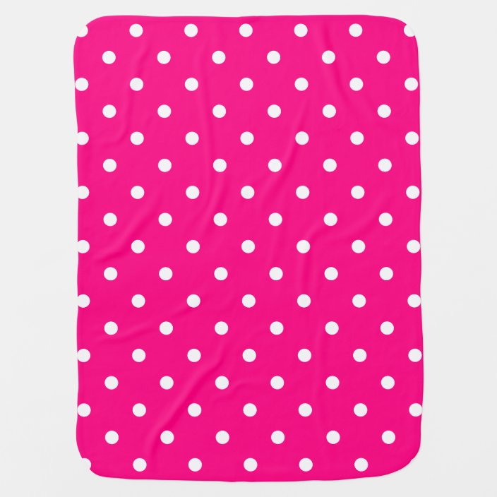 pink baby blanket with white polka dots