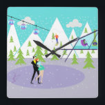 Retro Winter Ski Resort Wall Clock<br><div class="desc">This Retro Winter Ski Resort Wall Clock has something for everyone. The picturesque cartoon drawing features a snow-covered mountain range with green cedar trees. A lone skier, wearing red, orange, and royal blue, can be seen swooshing down the tallest mountain. Snow is continuing to fall from clouds in the turquoise...</div>