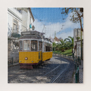 Retro yellow tram on street in Lisbon, Portugal Jigsaw Puzzle
