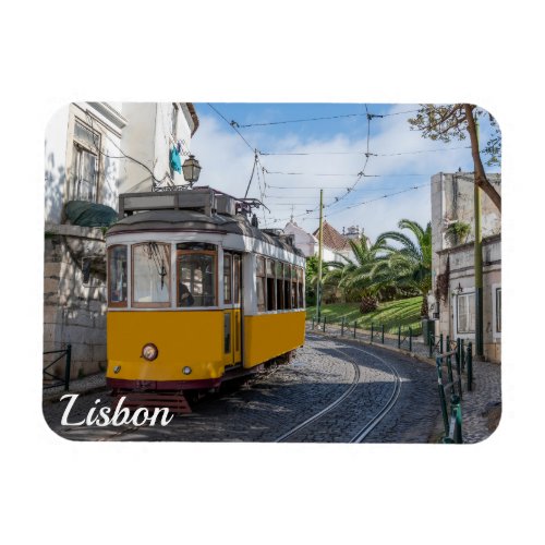 Retro yellow tram on street in Lisbon Portugal Magnet