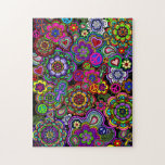 Retromania 2 Jigsaw Puzzle<br><div class="desc">A jigsaw puzzle with a lively and colorful design of peace signs, paisley, ankhs, hearts, and flowers. A far-out flash back to the 1960's.</div>