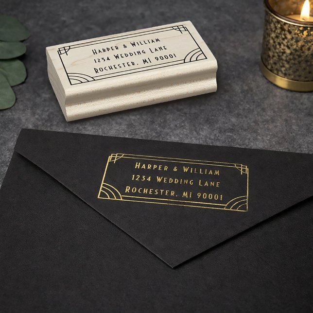 Return address stamp (Art deco return address stamp displayed in gold ink.
)