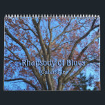 Rhapsody of Blues - Calendar<br><div class="desc">Blue is my favorite color. Is it yours, too? Or perhaps someone you know... As you follow the seasons with this calendar, you will discover landscapes, flowers, and wildlife that share the color blue. Take in the pale blue light following a snowstorm, a Bluejay twosome (I call this photo "The...</div>