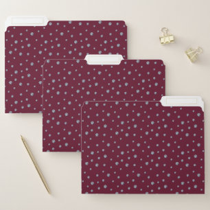 Rhinestones on dark red file folder