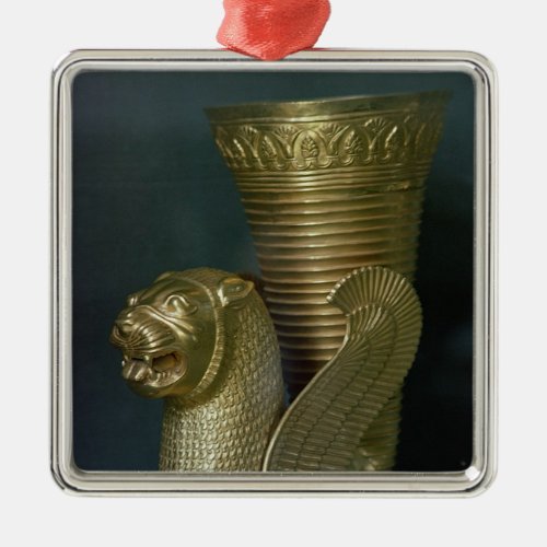 Rhyton in the shape of a seated lion_monster metal ornament
