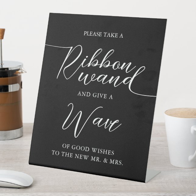 Ribbon Wand Wave Minimalist Black and White Script Pedestal Sign (In SItu)