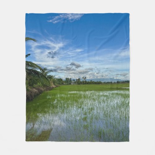 Rice field under a blue sky fleece blanket