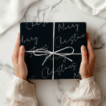 Rich Black Merry Christmas  Wrapping Paper<br><div class="desc">Modern,  plain-colored wrapping paper. A modern Bohemian rich black with Merry Christmas in handwritten font printed in a repeating pattern. Rich Black Merry Christmas Wrapping Paper.</div>