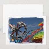 Rides at a county fair against a blue sky (Front/Back)