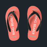 Ring Bearer NAME Coral Kid's Flip Flops<br><div class="desc">Ring Bearer is written in white text against bright coral color with black accents. Name and Date of Wedding is turquoise blue. Personalize your little ring bear boy's name in arched uppercase letters. Click Customize to increase or decrease name size to fall within safe lines. Fun beach destination flip flops...</div>