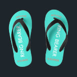 Ring Bearer NAME Turquoise Blue Kid's Flip Flops<br><div class="desc">Ring Bearer is written in white text against bright happy turquoise blue color with black accents. Name and Date of Wedding is in coral text. Personalize your little ring bear boy's name in arched uppercase letters. Click Customize to increase or decrease name size to fall within safe lines. Fun beach...</div>