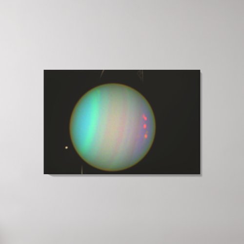 Rings and Moons Circling Uranus Canvas Print