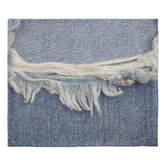 Ripped jeans texture, stylish background. duvet cover