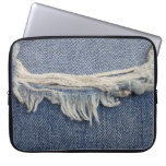 Ripped jeans texture, stylish background. laptop sleeve