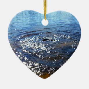 Ripples in a lake, from a fish jumping ceramic ornament