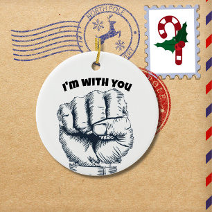 Rised clenched fist ceramic ornament