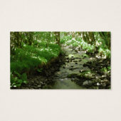 River flowing through woodland. (Back)