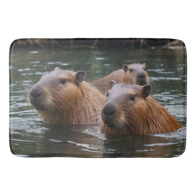 "River Serenity: Capybaras Swimming in the Flow" Bath Mat (Front)