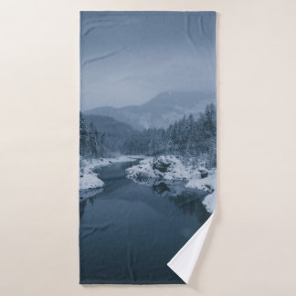 RIVER SURROUNDED BY SNOW COVERED FIELD WITH PINE T BATH TOWEL