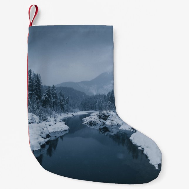 RIVER SURROUNDED BY SNOW COVERED FIELD WITH PINE T SMALL CHRISTMAS STOCKING (Front)