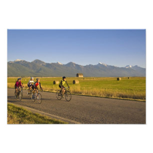 Road bicyclists ride down a back country road photo print