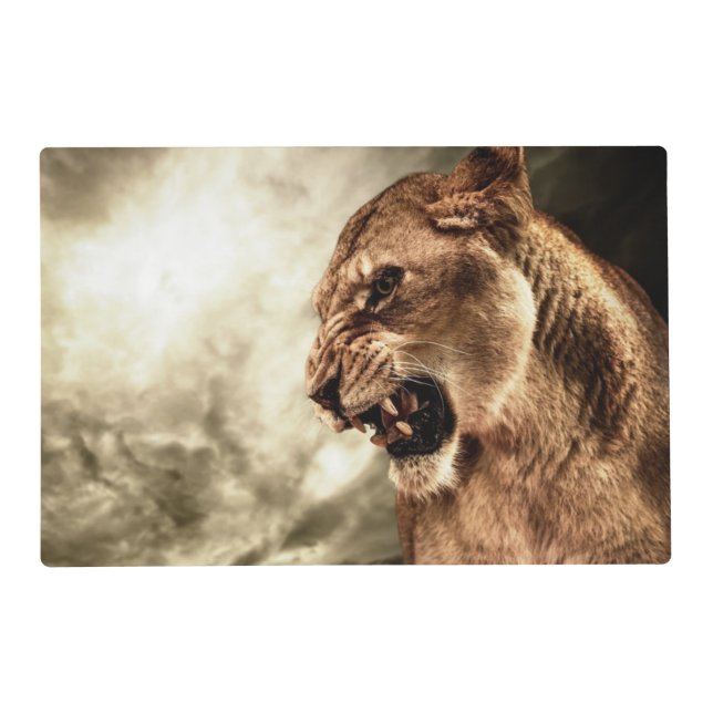 Roaring lioness against stormy sky placemat (Front)