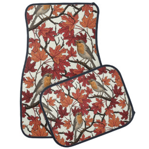 Robins in maple tree on off white car floor mat